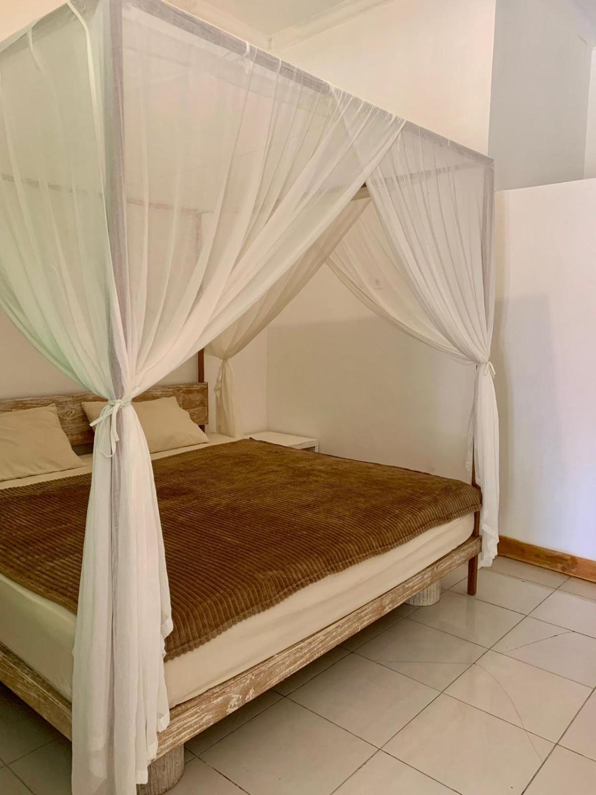 The Village Rua Beach Homestay Экстерьер фото
