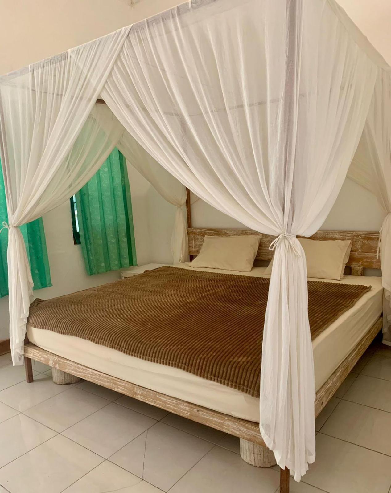 The Village Rua Beach Homestay Экстерьер фото